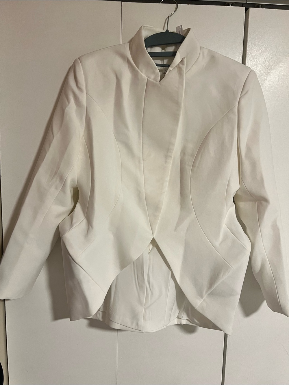 Miss Rosier back zip jacket-like top.